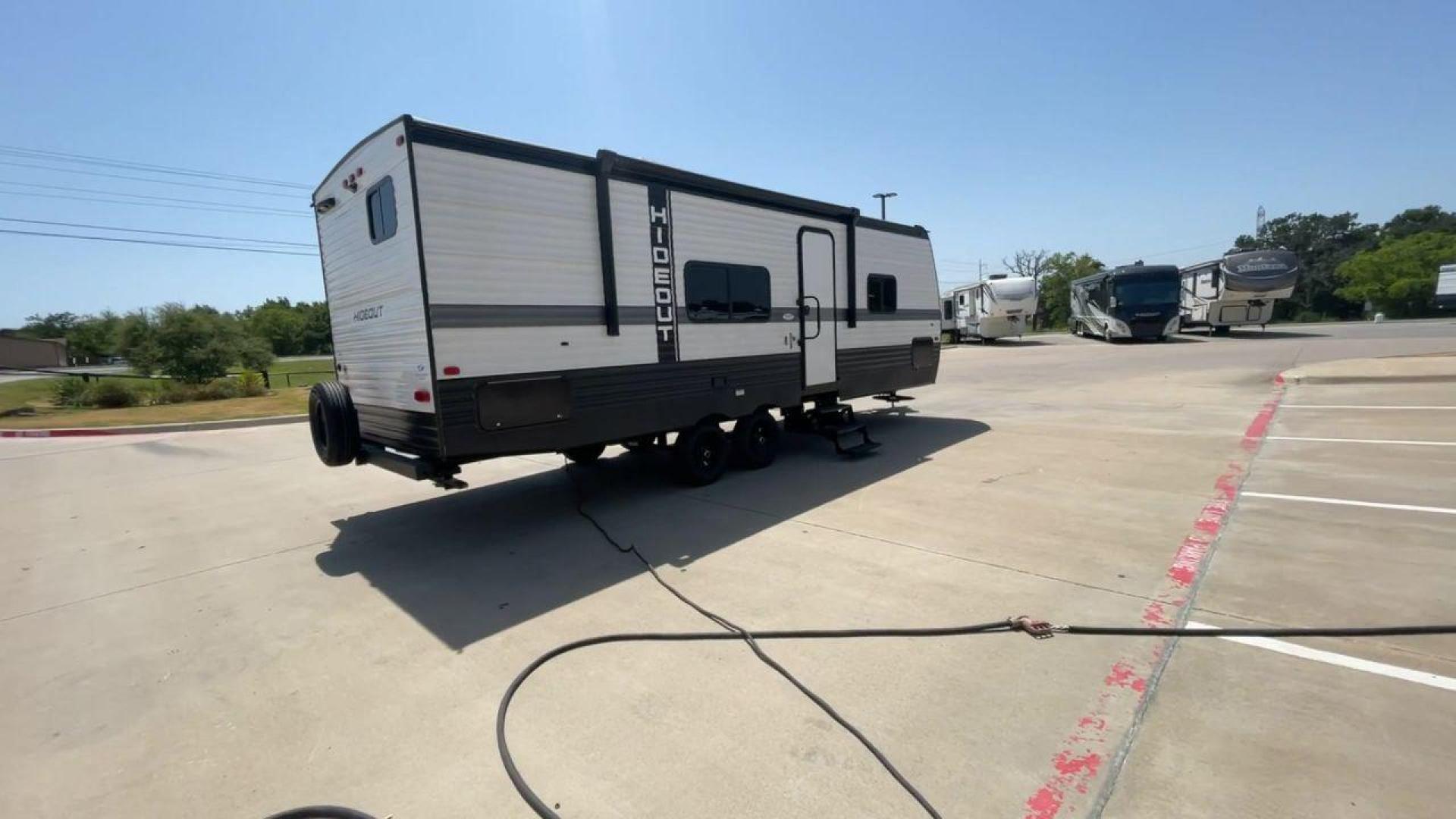 2024 KEYSTONE HIDEOUT 240BH (4YDTH1L21R7) , Length: 28.83 ft. | Gross Weight: 7,600 lbs transmission, located at 4319 N Main St, Cleburne, TX, 76033, (817) 678-5133, 32.385960, -97.391212 - Photo#1