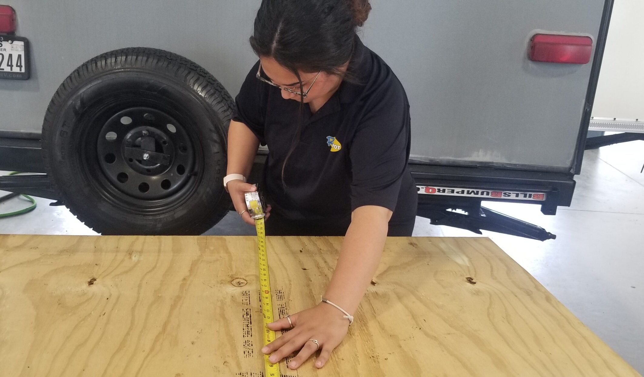 Woman measuring board