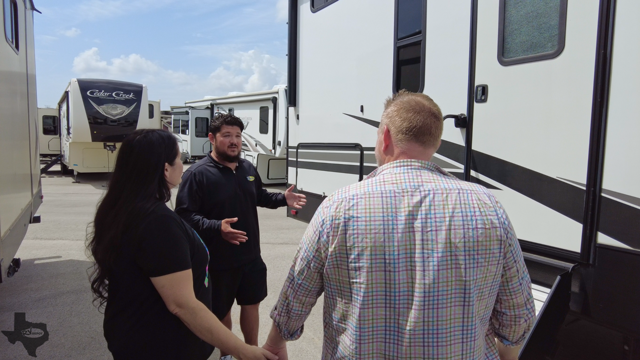 RV Depot - Customers Shopping with Sales person with logo Customers Shopping with Sales person