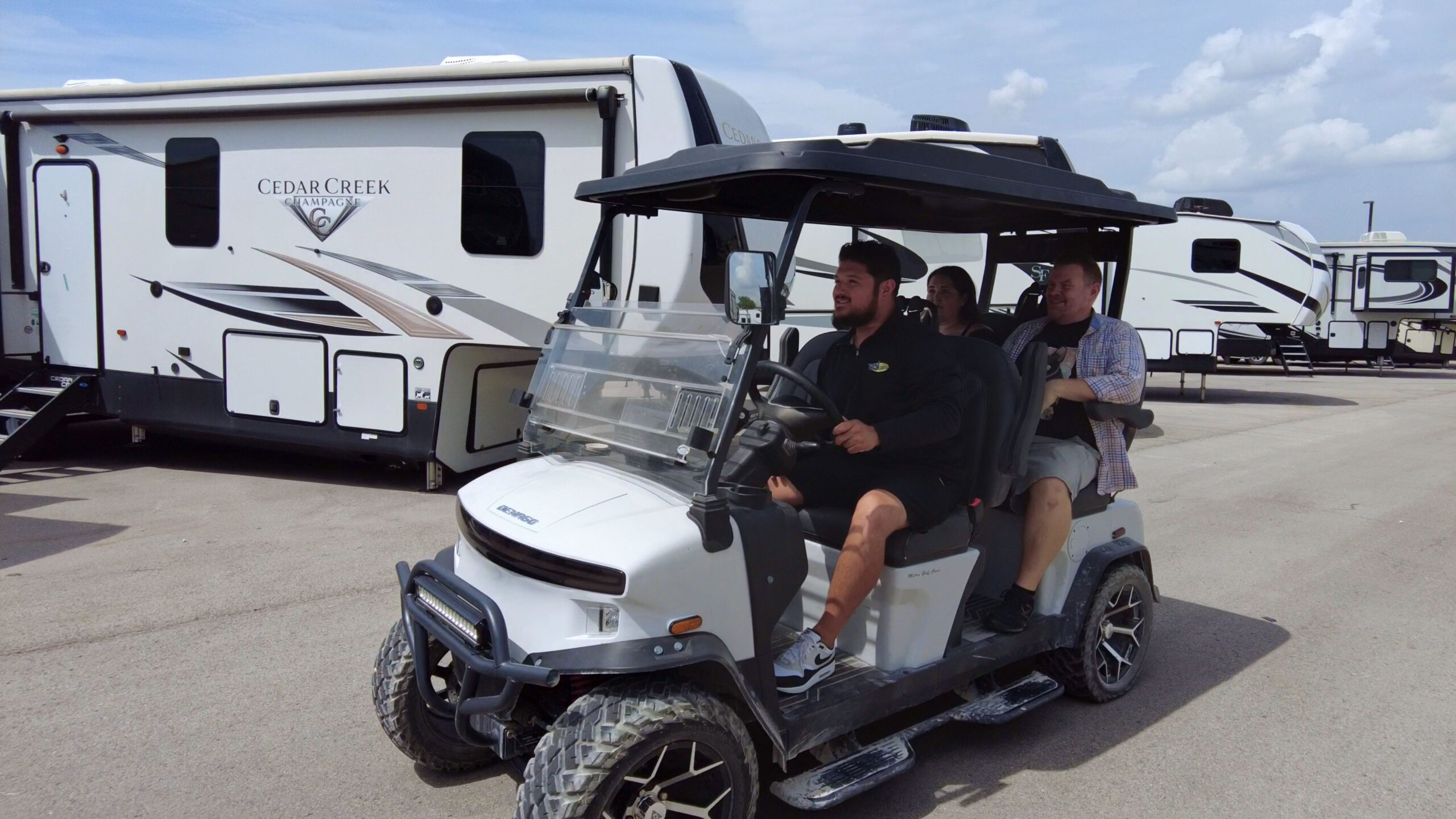 Driving through the RV Depot lot past rows of units
