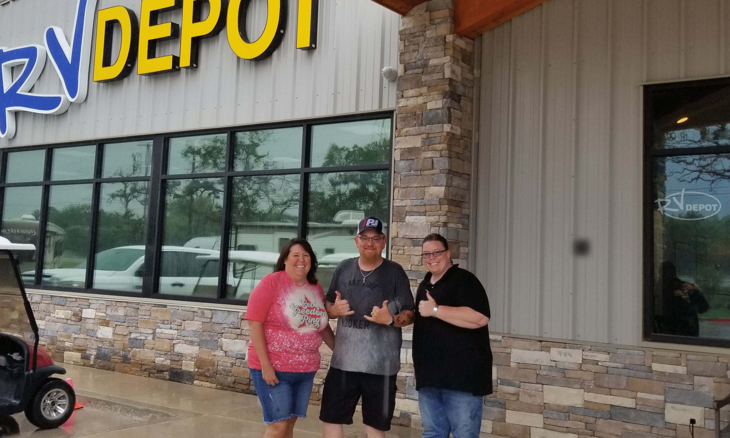 Happy Campers with Sales Person