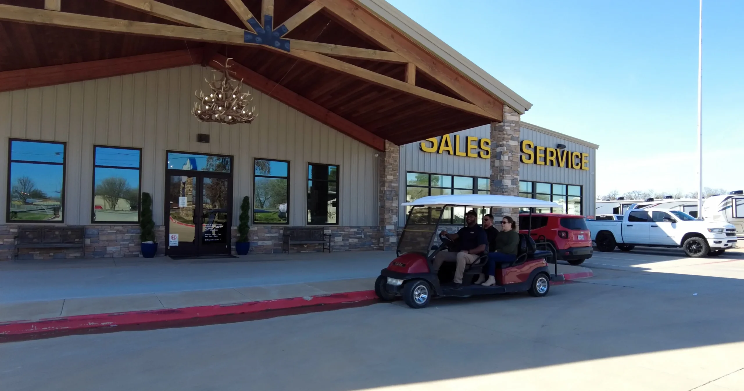 RV Depot - contact scaled Customers being driven around on a golf cart